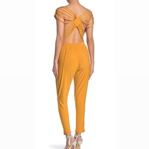 NWT Mustard Yellow Backless jumpsuit with pockets - women’s Large